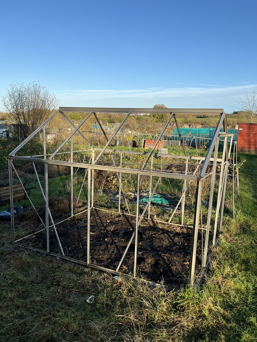 Greenhouse re-erected.