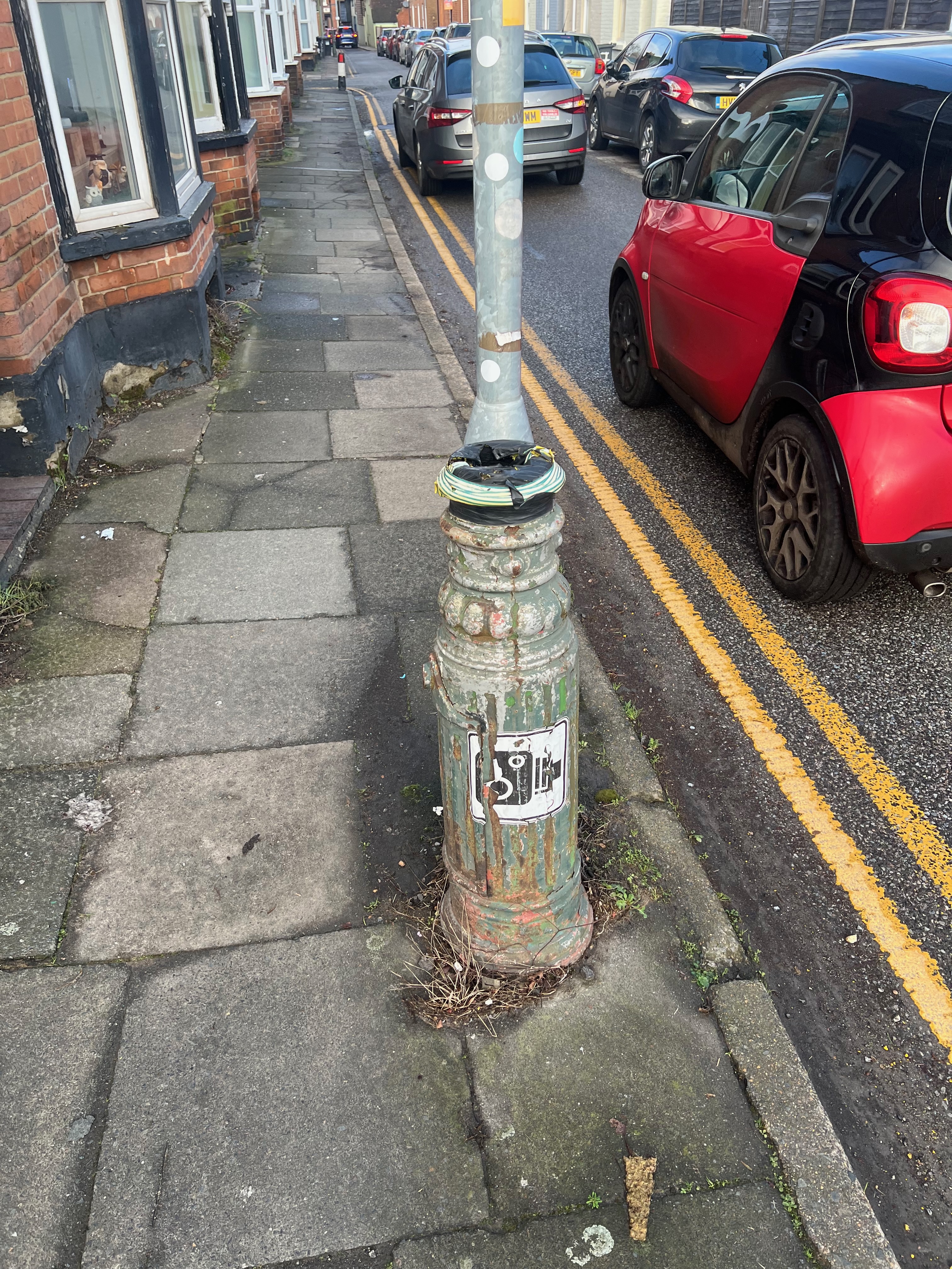 Badly removed lamp post on Castle Street